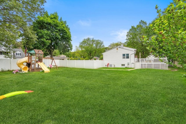 12 Pleasant Pl, Farmingville, NY 11738 - view of yard featuring a wooden deck and a playground