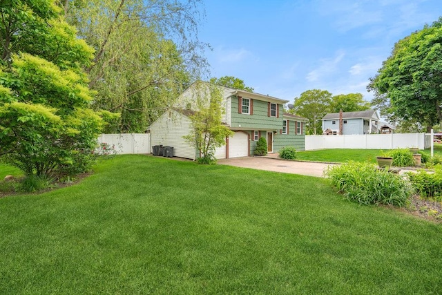 12 Pleasant Pl, Farmingville, NY 11738 - view of yard with driveway and an attached garage