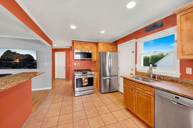 22 Livingston Ave, Valhalla, NY 10595 - kitchen featuring stainless steel appliances, a sink, recessed lighting, ornamental molding, and light stone countertops