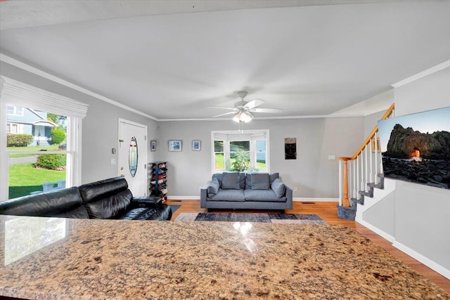 22 Livingston Ave, Valhalla, NY 10595 - living room featuring wood finished floors, stairs, crown molding, baseboards, and a ceiling fan