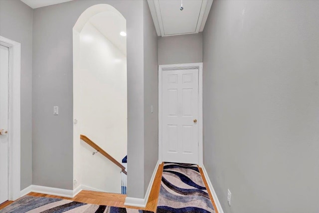 22 Livingston Ave, Valhalla, NY 10595 - corridor featuring an upstairs landing, wood finished floors, baseboards, and attic access