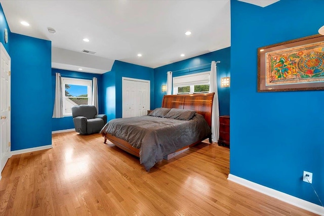 22 Livingston Ave, Valhalla, NY 10595 - bedroom featuring baseboards, wood finished floors, multiple windows, and recessed lighting