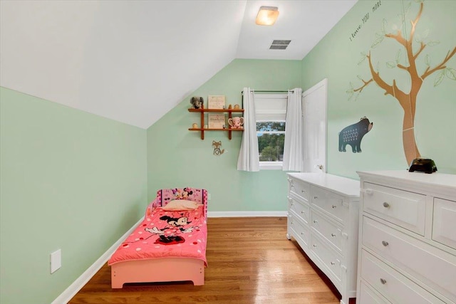 22 Livingston Ave, Valhalla, NY 10595 - bedroom featuring vaulted ceiling, light wood-style flooring, and baseboards