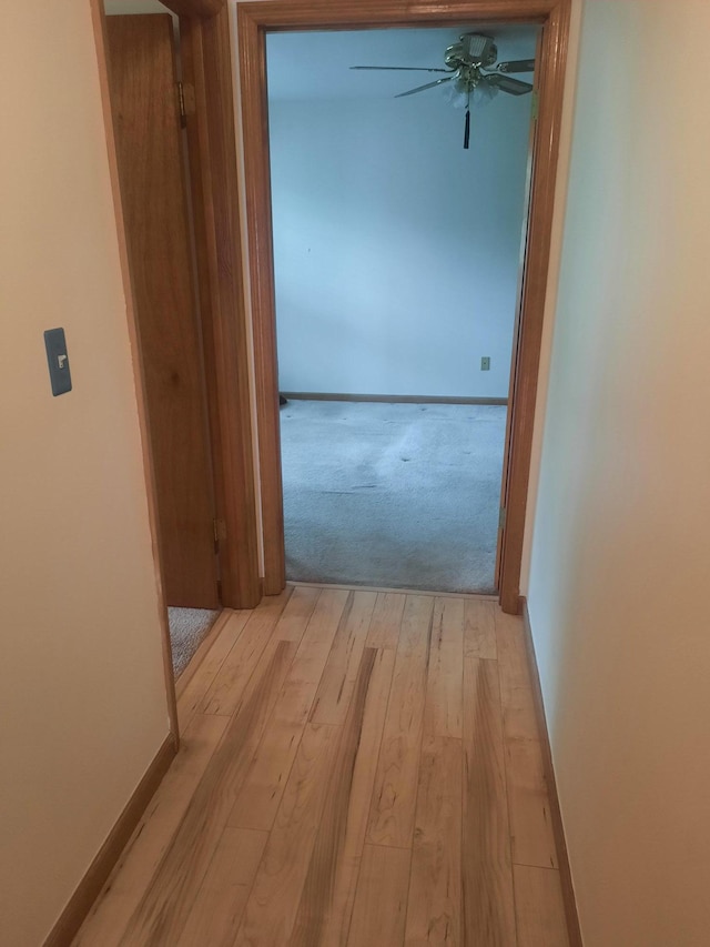 1502 Evergreen Ct, Highland Mills, NY 10930 - hall featuring light wood-type flooring, baseboards, and light colored carpet