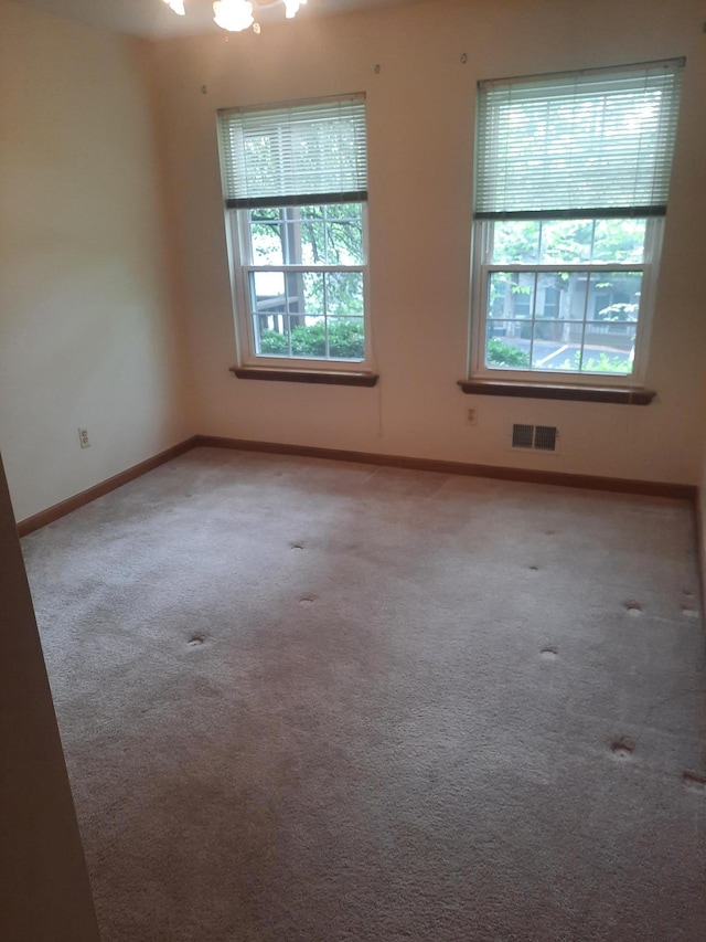 1502 Evergreen Ct, Highland Mills, NY 10930 - carpeted empty room with plenty of natural light and baseboards