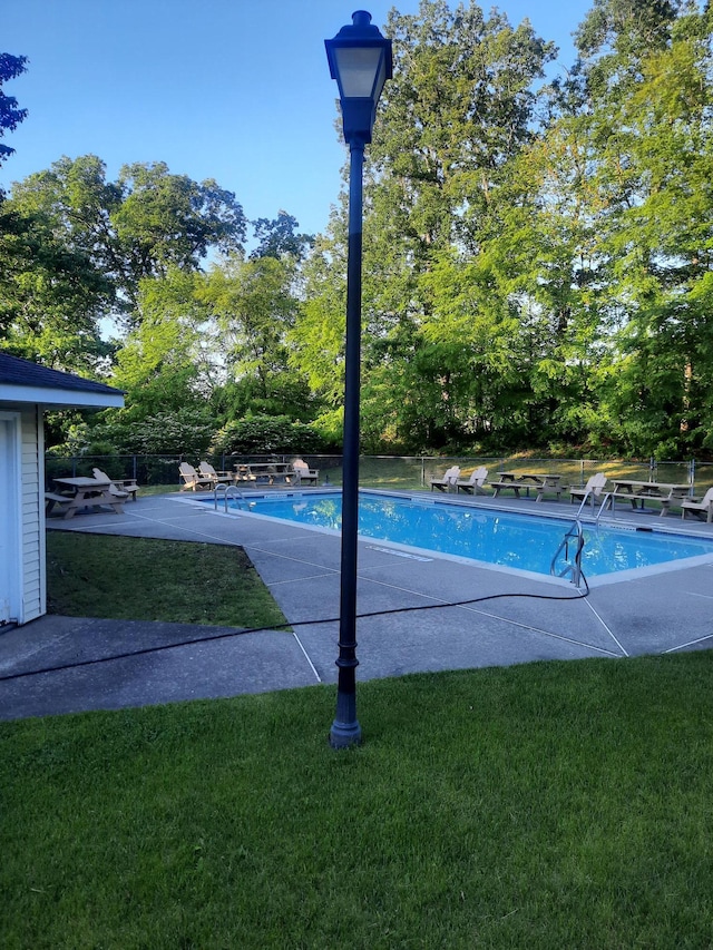 1502 Evergreen Ct, Highland Mills, NY 10930 - view of swimming pool featuring a patio and view of scattered trees