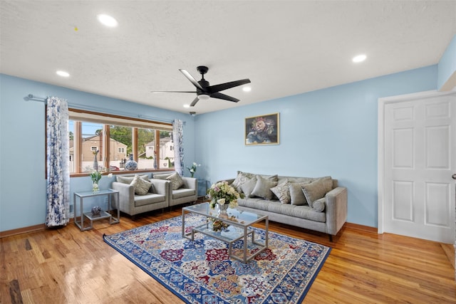 21 Westgate Rd, Massapequa Park, NY 11762 - living room with recessed lighting, wood finished floors, ceiling fan, and baseboards