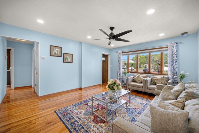 21 Westgate Rd, Massapequa Park, NY 11762 - living room with recessed lighting, ceiling fan, light wood-style flooring, and baseboards