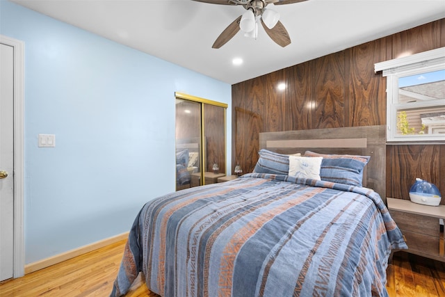 21 Westgate Rd, Massapequa Park, NY 11762 - bedroom with wood finished floors, a ceiling fan, baseboards, and a closet