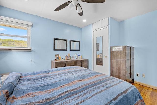 21 Westgate Rd, Massapequa Park, NY 11762 - bedroom featuring wood finished floors, baseboards, and ceiling fan