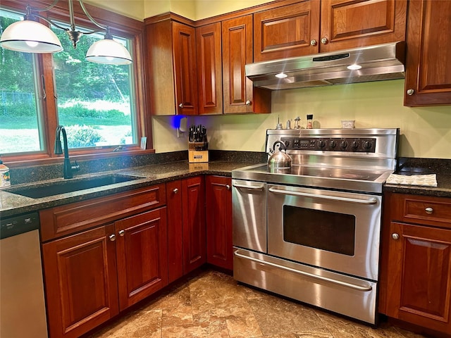 287 Hunns Lake Rd, Stanfordville, NY 12581 - kitchen featuring stainless steel appliances, under cabinet range hood, a sink, and dark stone countertops