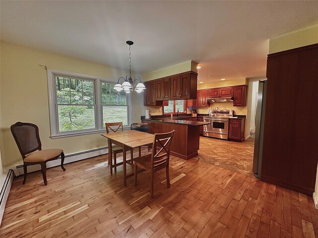 287 Hunns Lake Rd, Stanfordville, NY 12581 - dining space with light wood finished floors, a chandelier, and recessed lighting