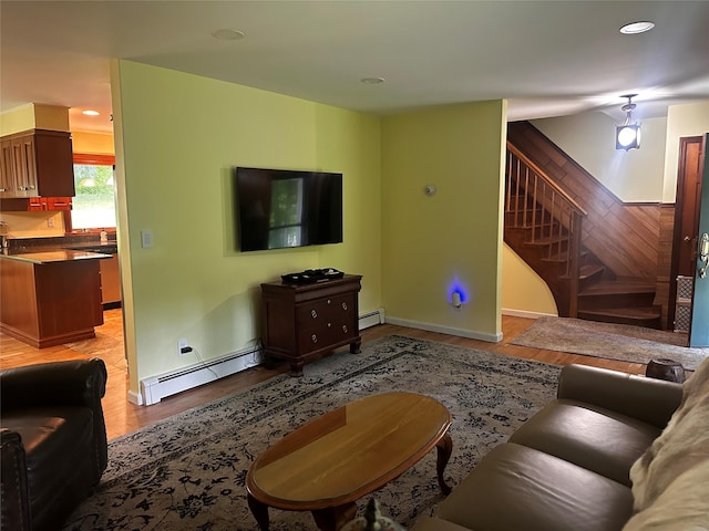 287 Hunns Lake Rd, Stanfordville, NY 12581 - living room featuring a baseboard radiator, stairs, light wood-style flooring, recessed lighting, and baseboards