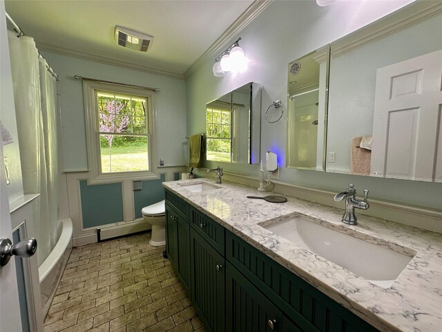 287 Hunns Lake Rd, Stanfordville, NY 12581 - bathroom featuring brick patterned floors, ornamental molding, double vanity, toilet, and a baseboard heating unit
