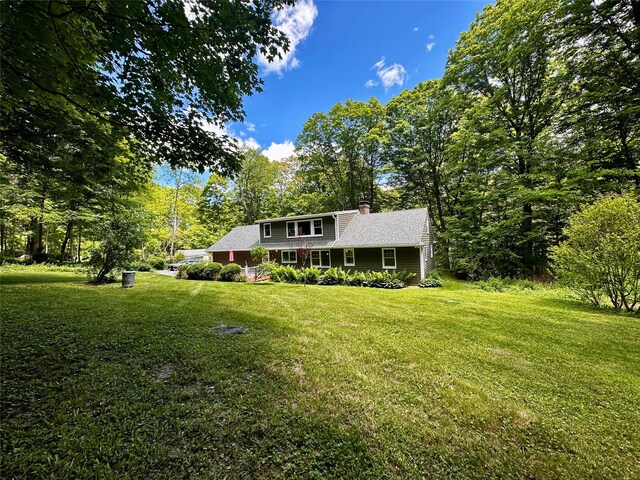 287 Hunns Lake Rd, Stanfordville, NY 12581 - view of front of home with a front lawn and a chimney