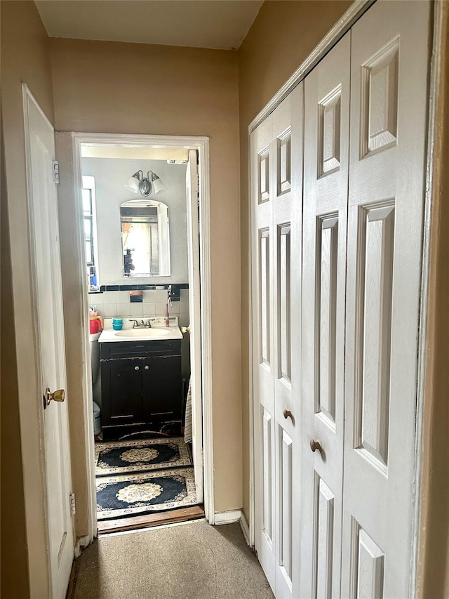 147-11 79th Ave Unit 3L, Flushing, NY 11367 - hallway with a sink and carpet flooring