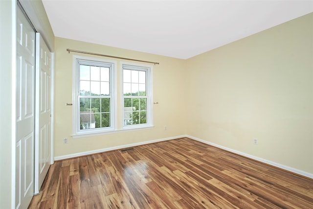 36 Bellefair Rd, Rye Brook, NY 10573 - empty room with baseboards and wood finished floors