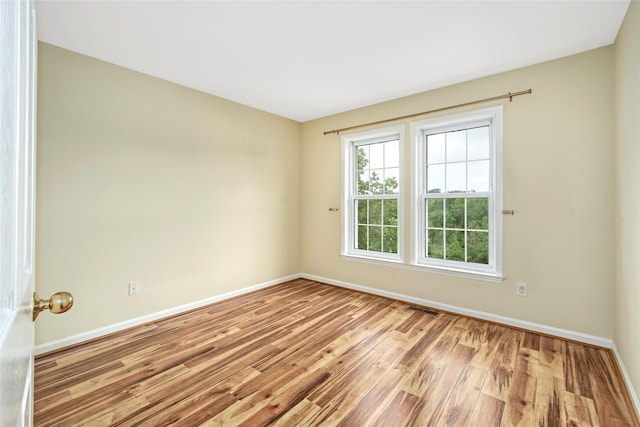 36 Bellefair Rd, Rye Brook, NY 10573 - spare room featuring baseboards and wood finished floors