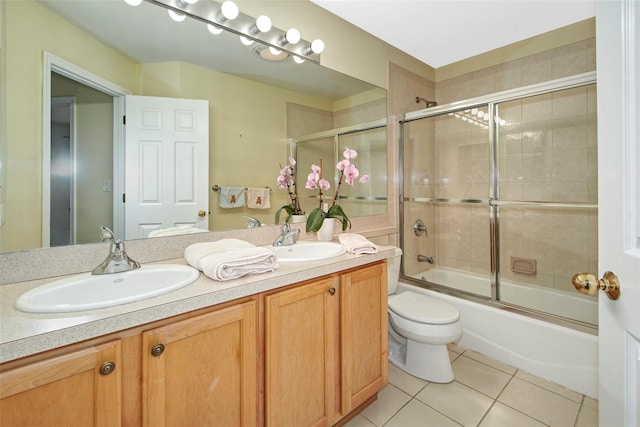 36 Bellefair Rd, Rye Brook, NY 10573 - full bathroom featuring double vanity, tile patterned floors, and enclosed tub / shower combo