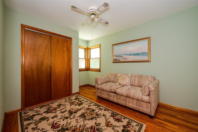 1158 Lorraine Dr, Franklin Square, NY 11010 - living room with wood finished floors, a ceiling fan, and baseboards