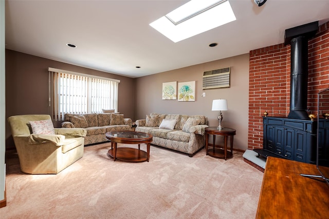 1158 Lorraine Dr, Franklin Square, NY 11010 - living area with a wood stove, light colored carpet, a skylight, and a wall mounted air conditioner