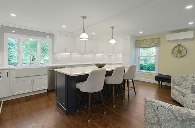 1 Lakeview Rd, South Salem, NY 10590 - kitchen featuring a wall mounted air conditioner, a sink, tasteful backsplash, dark wood-style floors, and stainless steel dishwasher