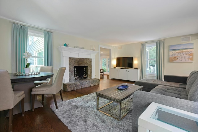 1 Lakeview Rd, South Salem, NY 10590 - living room with healthy amount of natural light, wood finished floors, and a fireplace