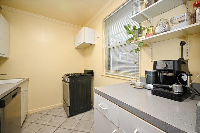 69-27 210th St Unit 2, Oakland Gardens, NY 11364 - kitchen featuring stainless steel appliances, crown molding, a sink, white cabinets, and light tile patterned floors