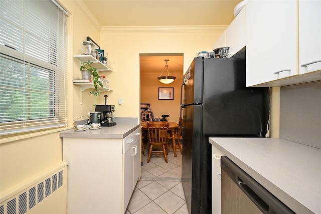 69-27 210th St Unit 2, Oakland Gardens, NY 11364 - kitchen featuring radiator heating unit, freestanding refrigerator, dishwasher, light tile patterned flooring, and white cabinets
