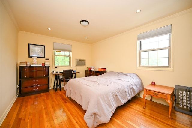 69-27 210th St Unit 2, Oakland Gardens, NY 11364 - bedroom with hardwood / wood-style floors, crown molding, a wall mounted air conditioner, baseboards, and recessed lighting