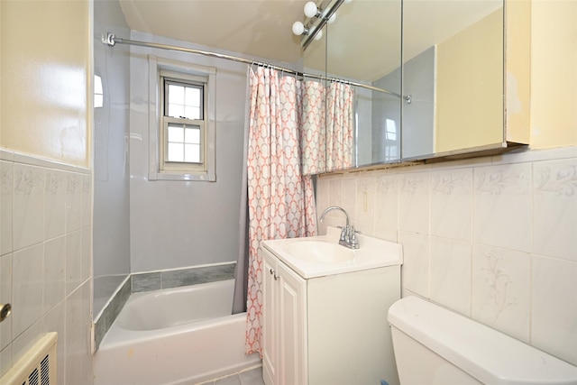 69-27 210th St Unit 2, Oakland Gardens, NY 11364 - full bathroom with shower / bath combo, toilet, vanity, and tile walls