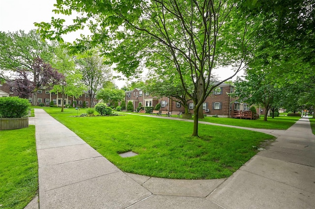 69-27 210th St Unit 2, Oakland Gardens, NY 11364 - surrounding community featuring a residential view and a yard