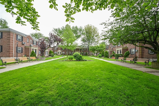 69-27 210th St Unit 2, Oakland Gardens, NY 11364 - view of property's community with a residential view and a yard