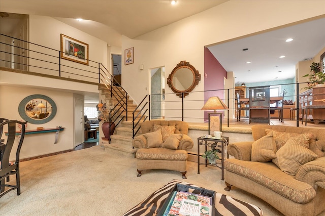 1055 Cedarhurst St, North Woodmere, NY 11581 - living room featuring carpet flooring, stairs, and recessed lighting