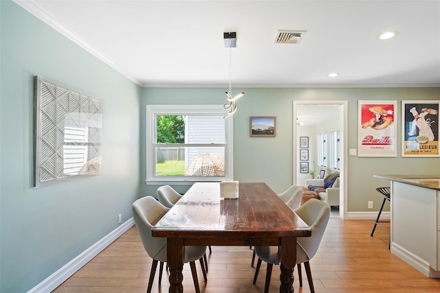 801 Syska Rd, Ossining, NY 10562 - dining space featuring ornamental molding, light wood finished floors, recessed lighting, and baseboards