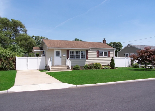 31 Saint Joseph Ave, Ronkonkoma, NY 11779 - view of front facade featuring a gate, driveway, and a chimney