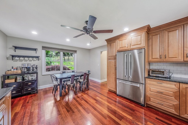 8 Bridle Path Rd, Smithtown, NY 11787 - kitchen featuring high quality fridge, dark wood-type flooring, baseboards, ceiling fan, and tasteful backsplash
