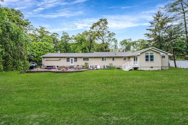 8 Bridle Path Rd, Smithtown, NY 11787 - rear view of property with a patio area, crawl space, and view of wooded area