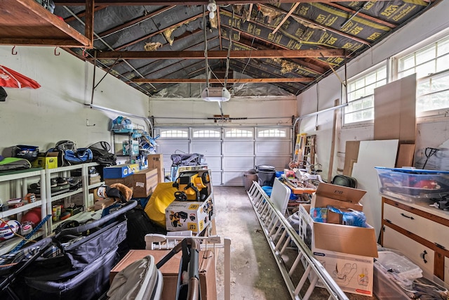 8 Bridle Path Rd, Smithtown, NY 11787 - garage featuring a garage door opener