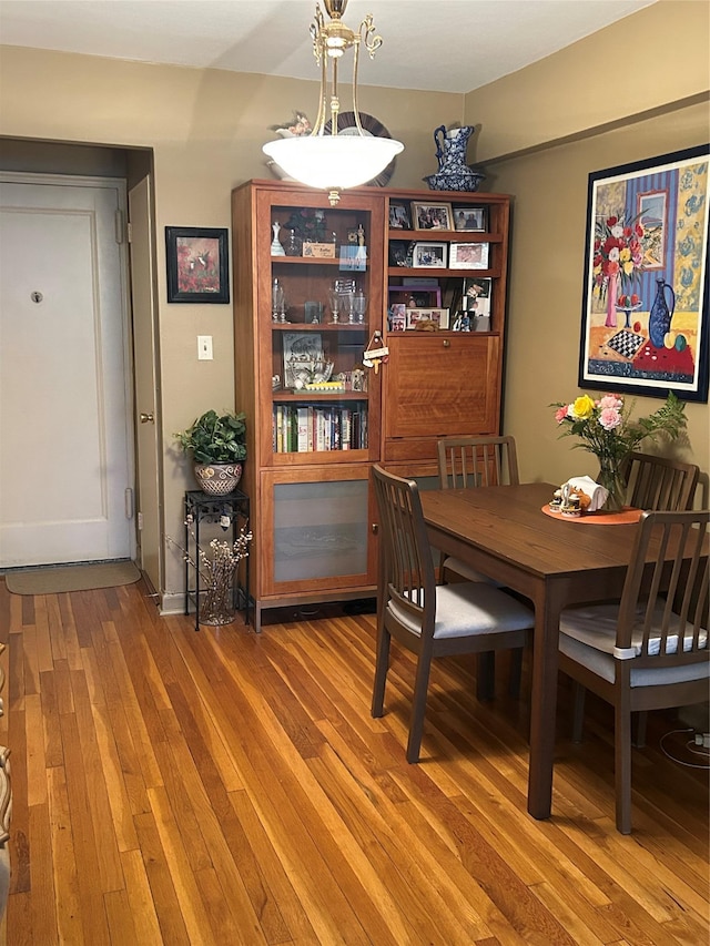 110-20 71st Ave Unit 411, Forest Hills, NY 11375 - dining area featuring light wood-style flooring