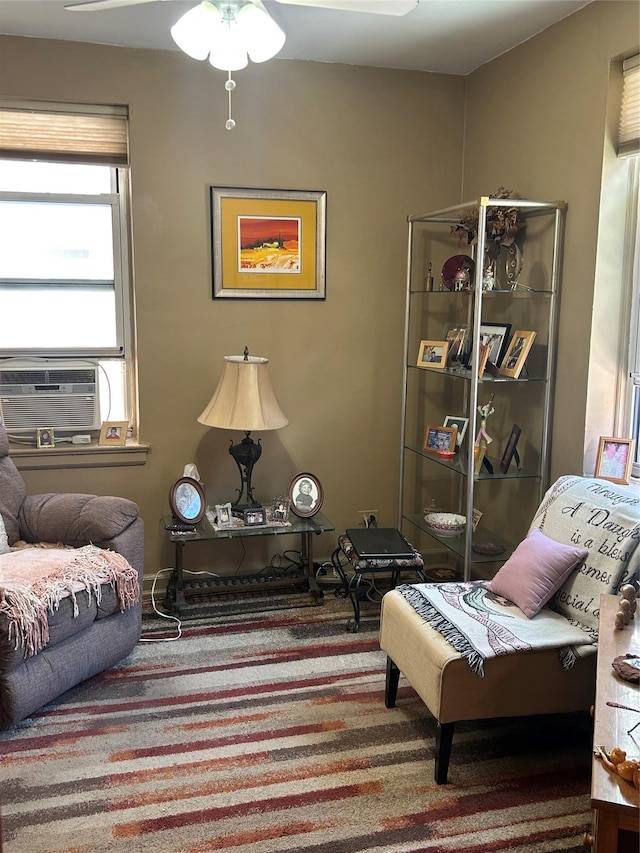 110-20 71st Ave Unit 411, Forest Hills, NY 11375 - sitting room featuring ceiling fan, cooling unit, and carpet flooring