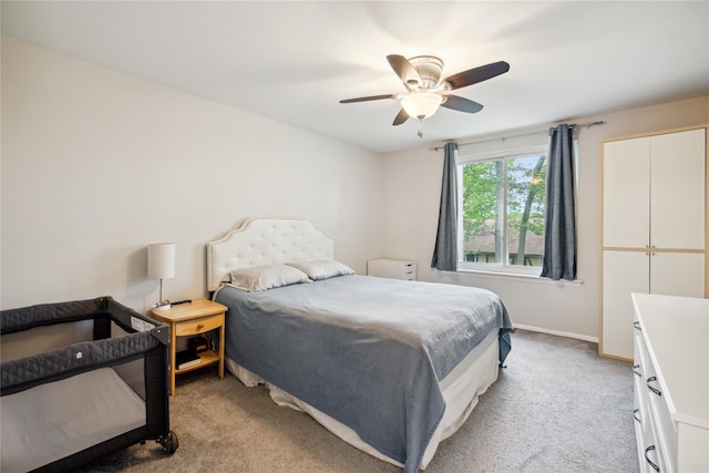 65 Sagamore Hills Dr, Port Jefferson Station, NY 11776 - bedroom featuring light colored carpet, baseboards, and a ceiling fan