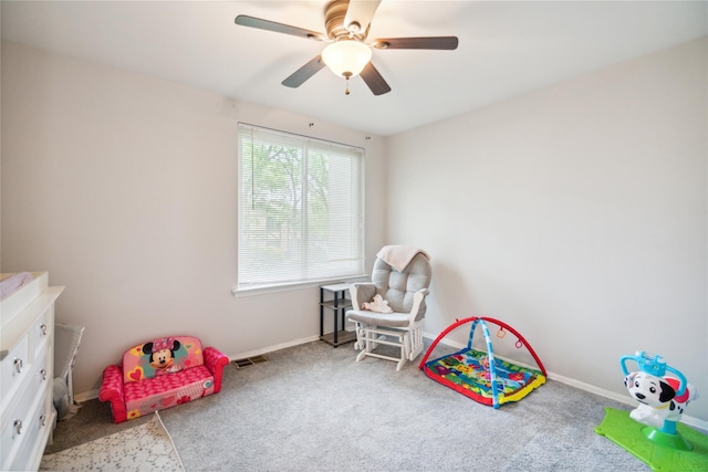 65 Sagamore Hills Dr, Port Jefferson Station, NY 11776 - game room featuring carpet floors, baseboards, and a ceiling fan