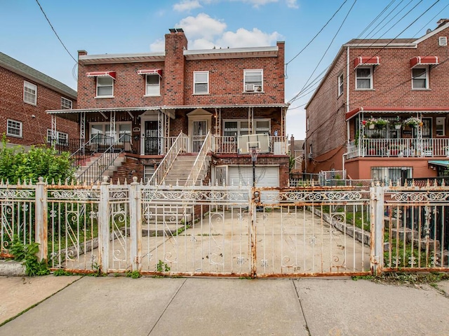 3333 Tiemann Ave, Bronx, NY 10469 - view of front facade with brick siding, a fenced front yard, an attached garage, and a chimney
