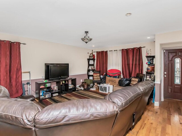 3333 Tiemann Ave, Bronx, NY 10469 - living room featuring light wood-style flooring and recessed lighting