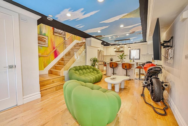 520 Meeker Ave, Brooklyn, NY 11222 - living room with light wood-style floors, recessed lighting, baseboards, and stairs