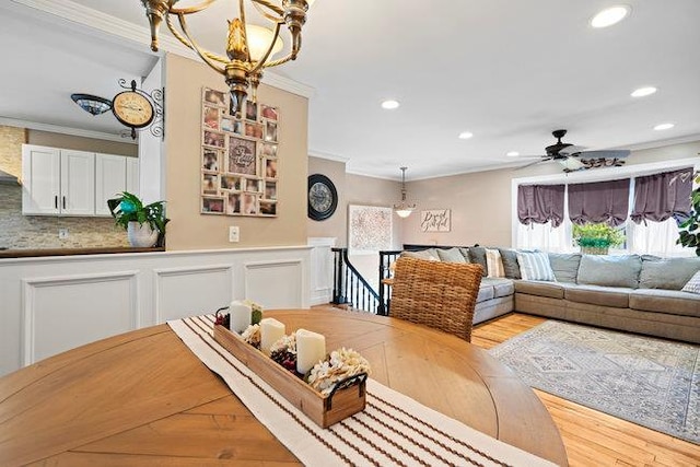 105 Fountain Ave, Selden, NY 11784 - living room featuring crown molding, ceiling fan, recessed lighting, and wood finished floors