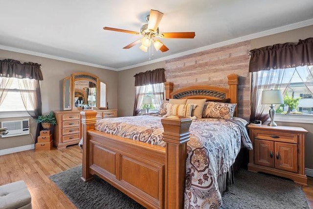 105 Fountain Ave, Selden, NY 11784 - bedroom with light wood-type flooring, ornamental molding, a ceiling fan, and a wall mounted AC