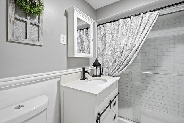 105 Fountain Ave, Selden, NY 11784 - bathroom featuring vanity, toilet, and a shower with curtain