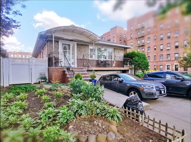 35-73 167th St, Flushing, NY 11358 - view of front facade featuring a gate and brick siding